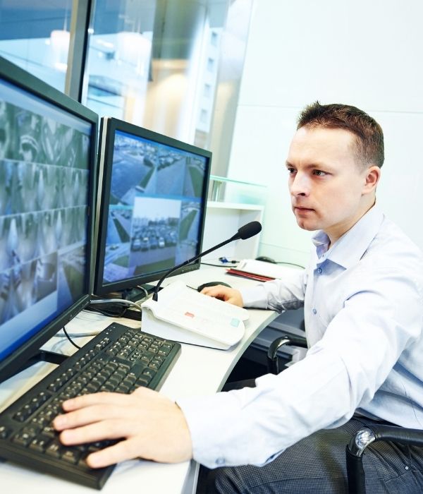 Security Camera Monitoring - Live Agent Watching CCTV Monitors